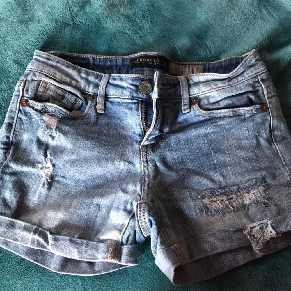 Distressed denim shorts